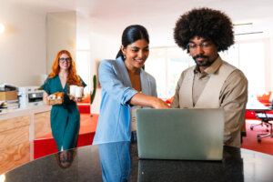 Multiethnic small group of businesspeople meeting in a coworking company office