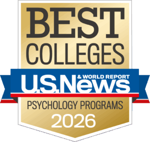 Gold badge noting UMBC as one of U.S. News and World Report's 2026 Best Colleges for Psychology programs.