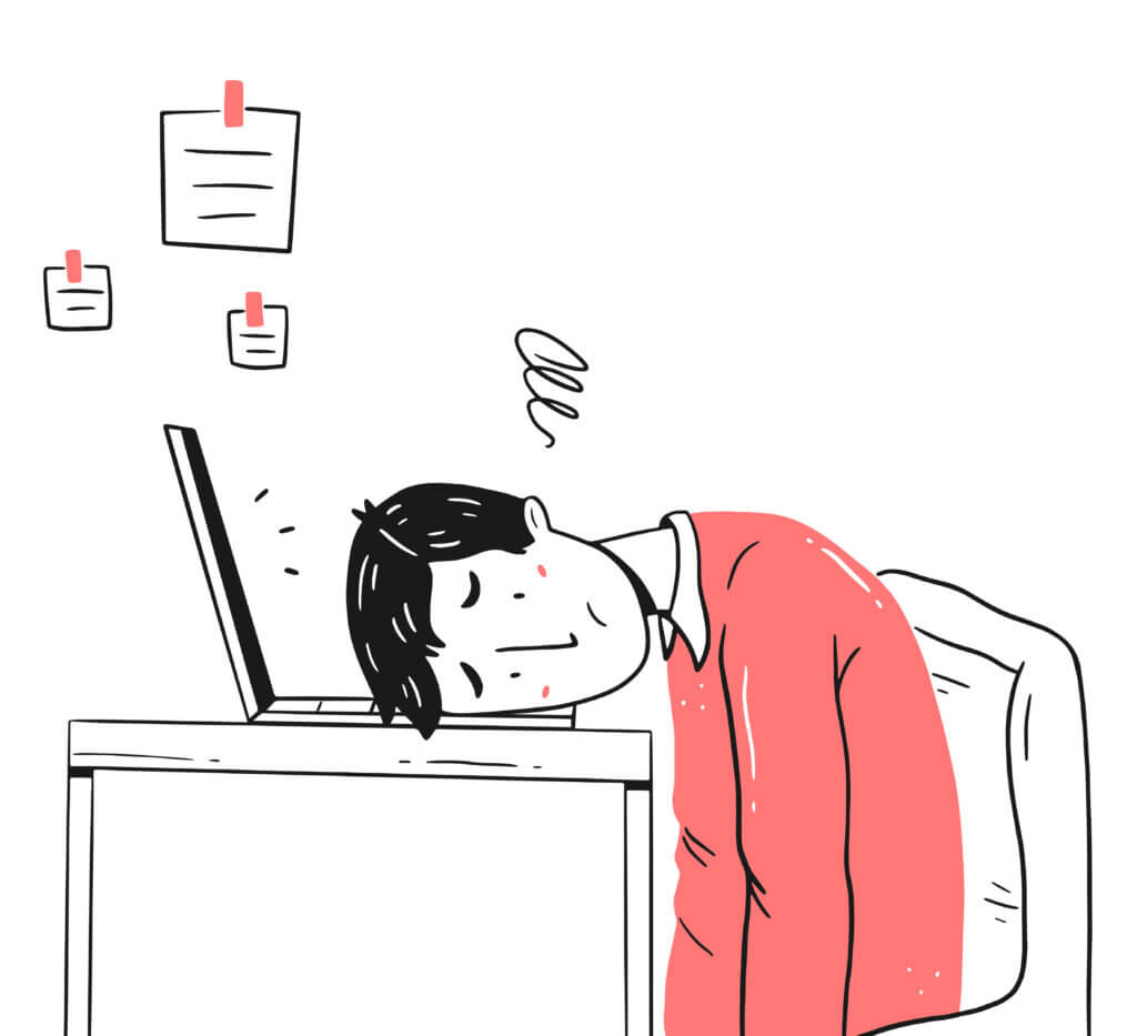 Illustration of a person sitting at their desk experiencing burnout.