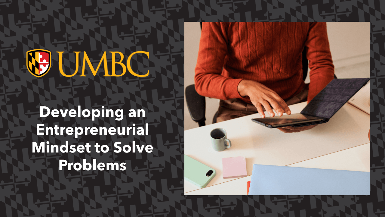 Person organizing their desk while developing an entrepreneurial mindset to boost focus, productivity, and creative problem-solving.