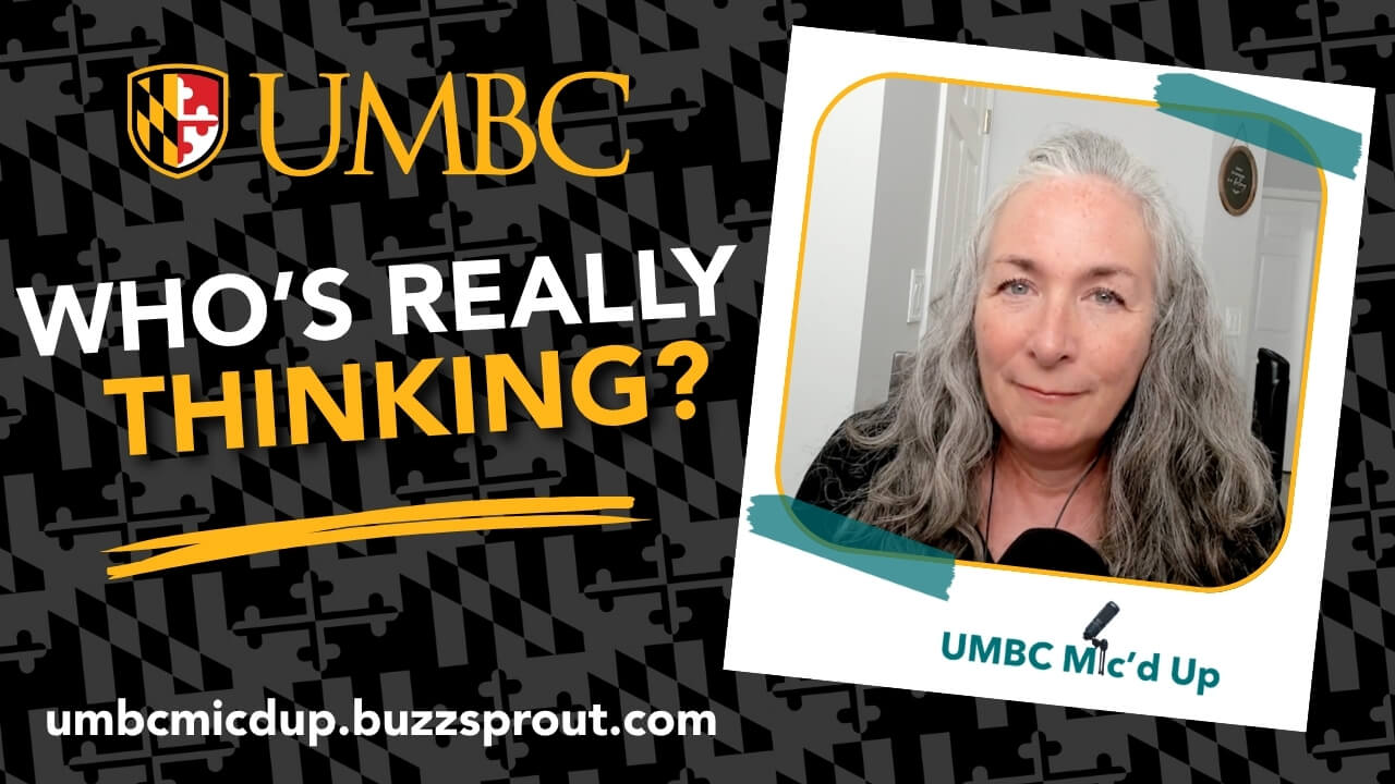 Promotional graphic for the "UMBC Mic'd Up" podcast titled "WHO'S REALLY THINKING?" against a patterned Maryland flag background. Features a headshot of a smiling woman with long gray hair in a framed photo polaroid style, with the website URL: umbcmicdup.buzzsprout.com.